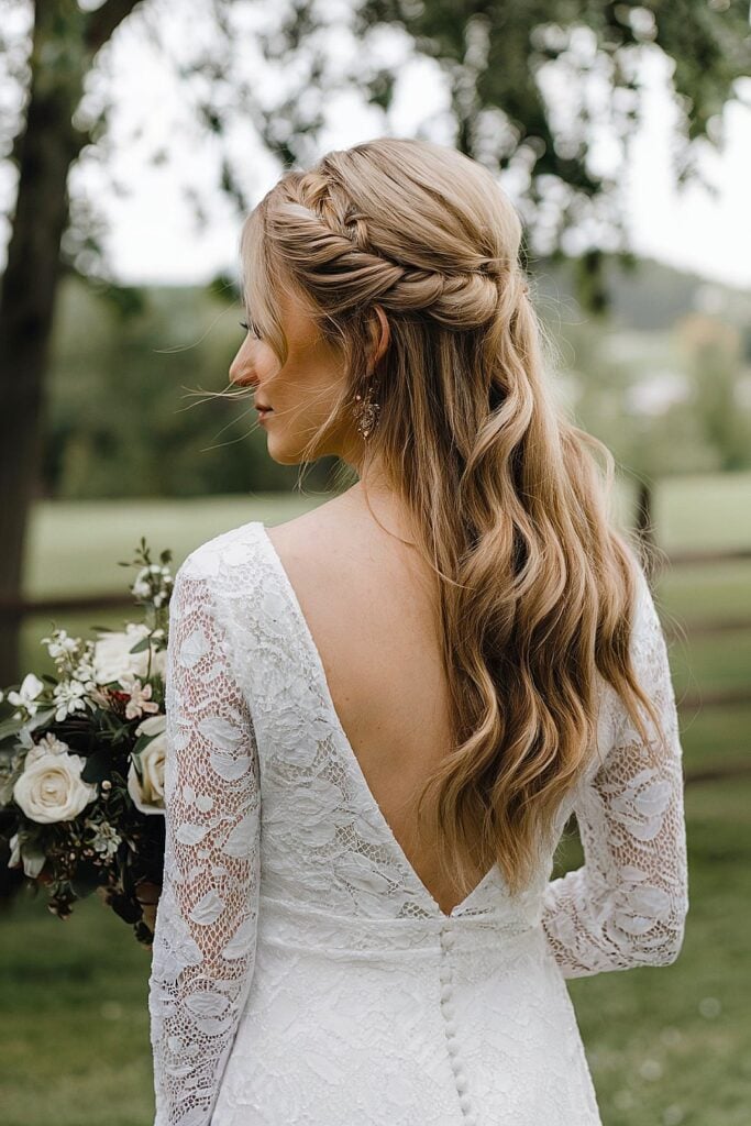Half-up half-down bridal hairstyle with twist and waves