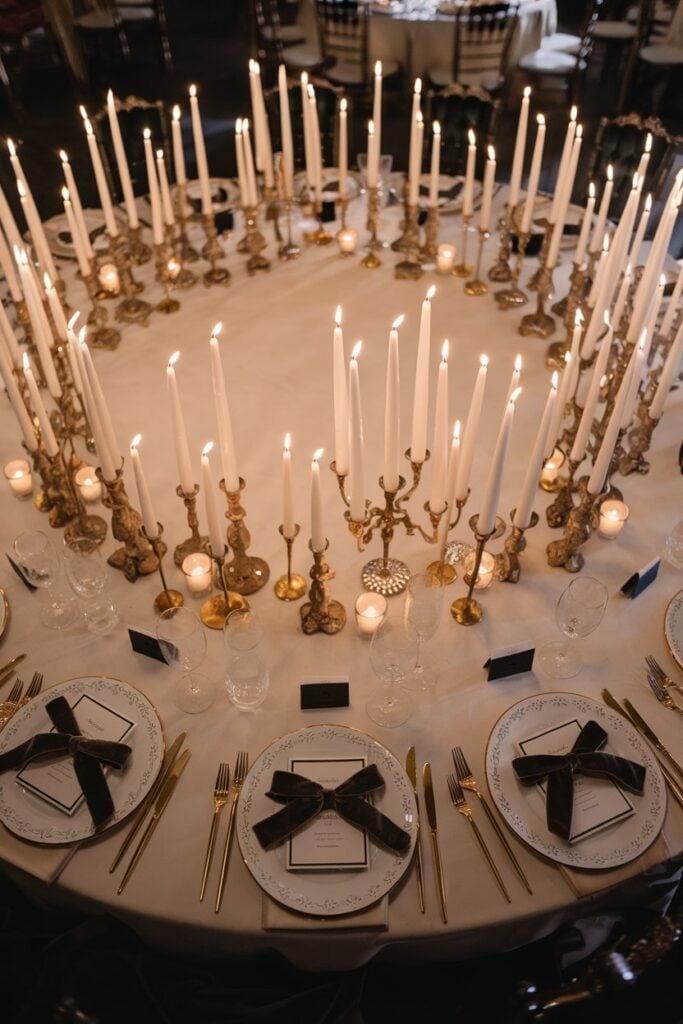 Romantic candle centerpiece with gold candlesticks for wedding.