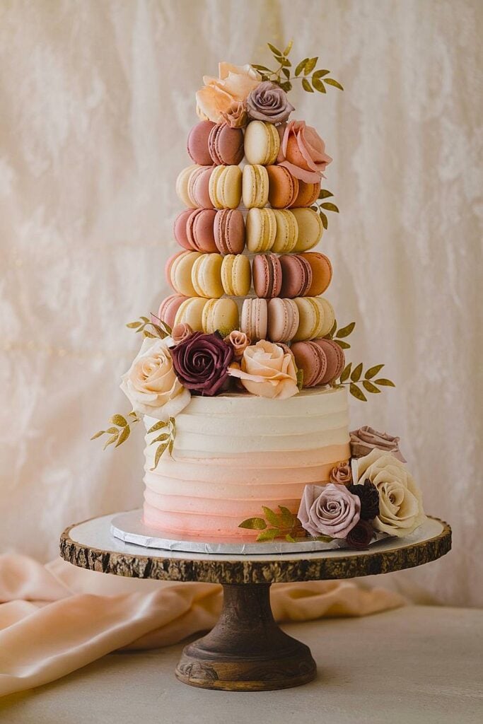 Wedding cake with macarons and cascading roses.