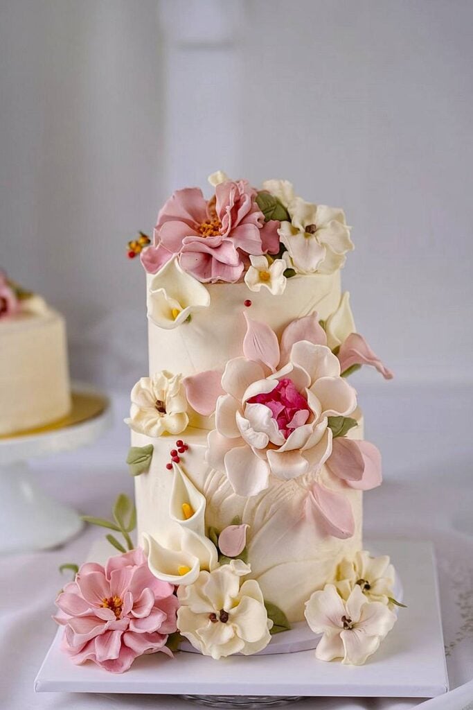 Korean wedding cake with pastel sugar flowers.