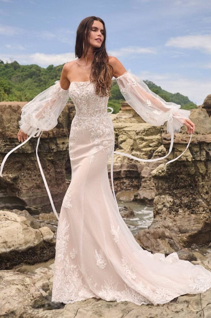 Boho fairytale wedding dress with off shoulder lace sleeves.