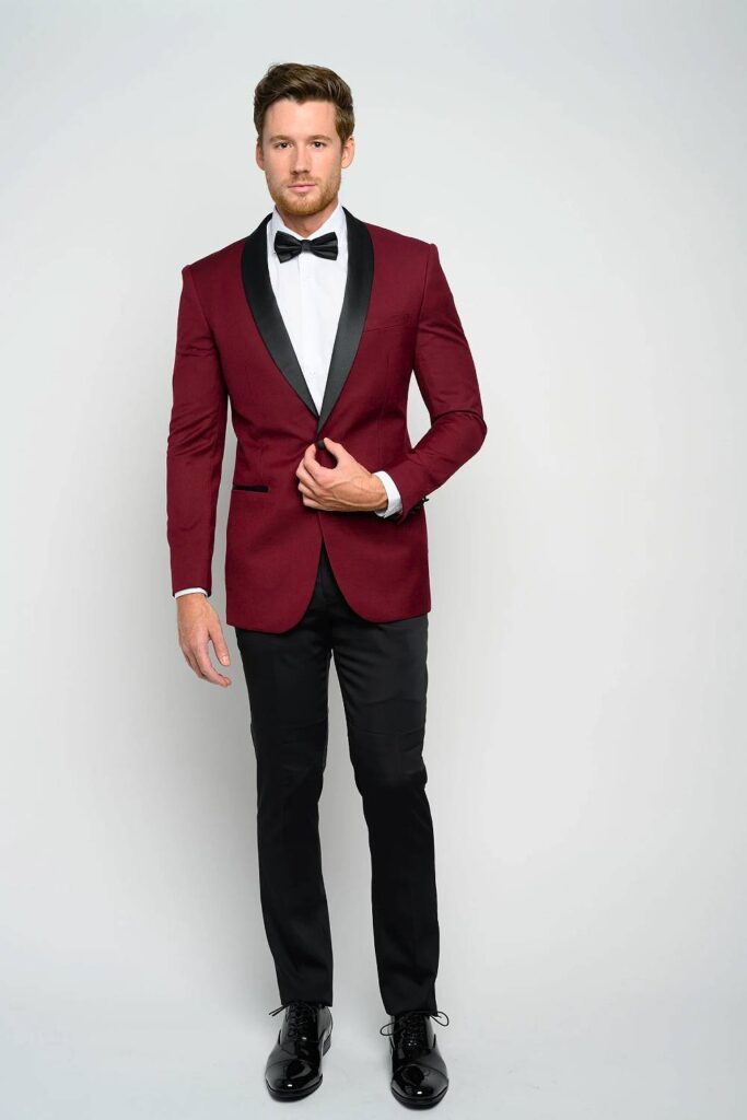 Burgundy tuxedo groomsmen suit with black lapel.