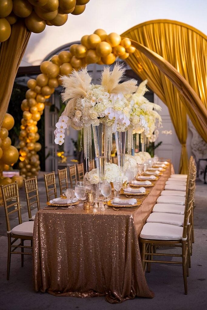 Glamorous gold bridal shower with sequin table setting.