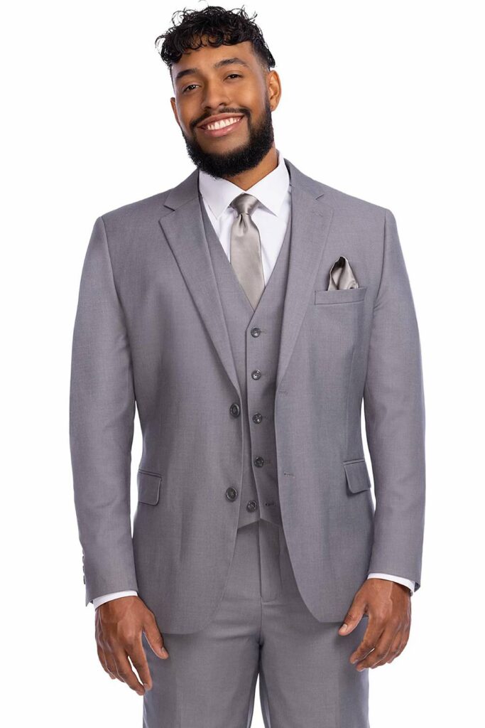 Light grey three-piece groomsmen suit wedding attire.