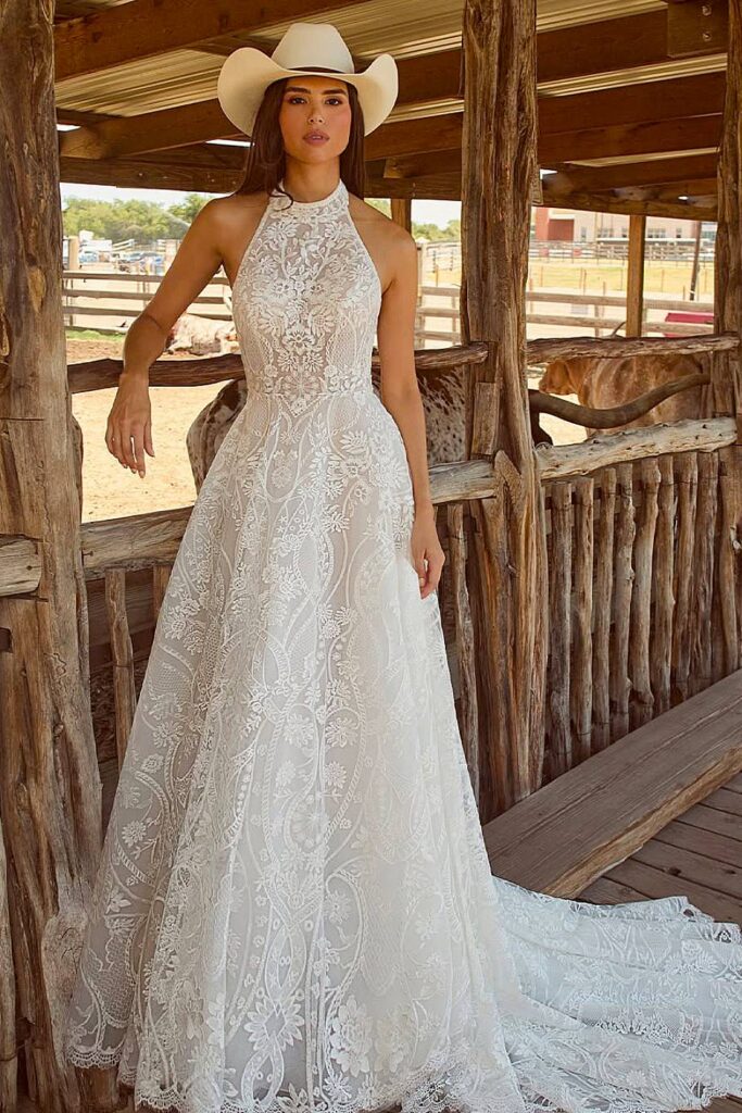 Halter boho wedding dress with lace details.