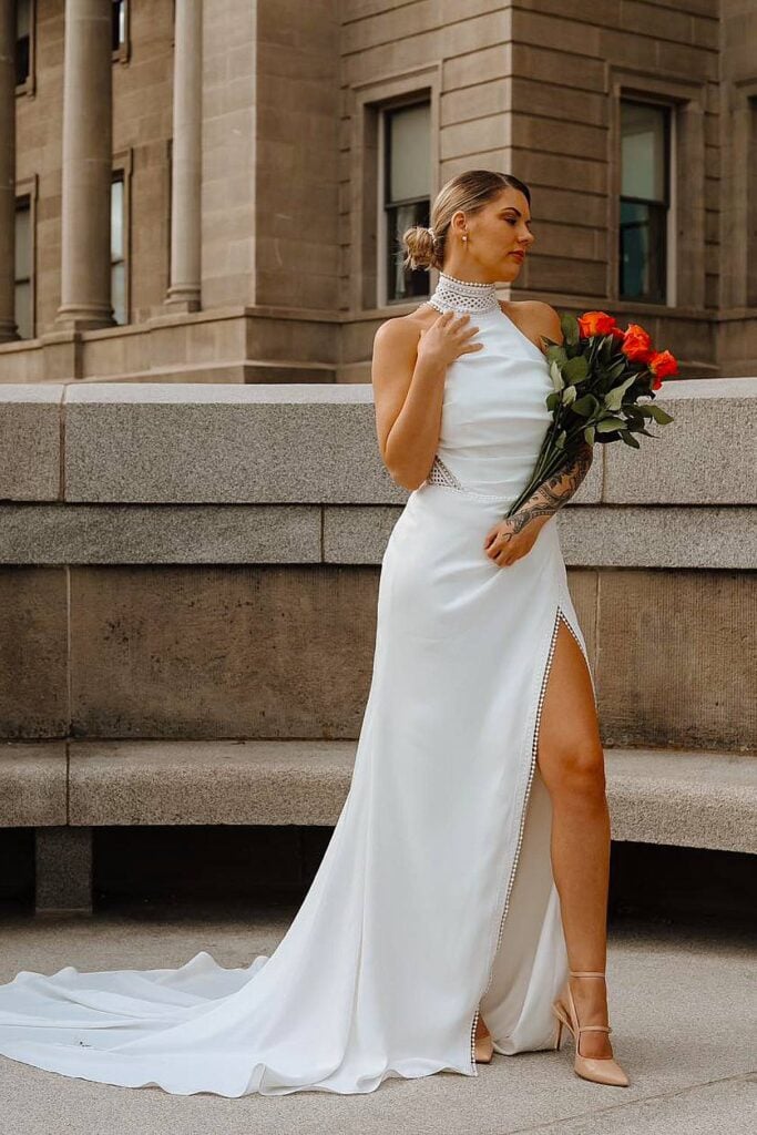 High neck boho wedding dress with thigh-high slit.