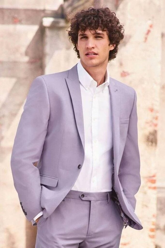 Lavender groomsmen suit light purple wedding attire.