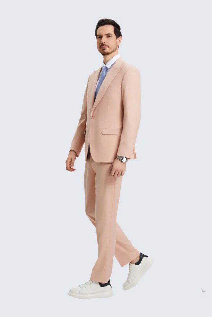 Light pink groomsmen suit blush wedding attire.