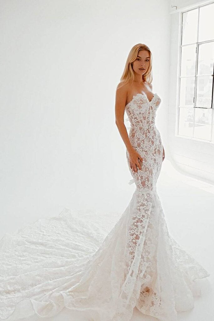 Mermaid boho wedding dress with lace train.