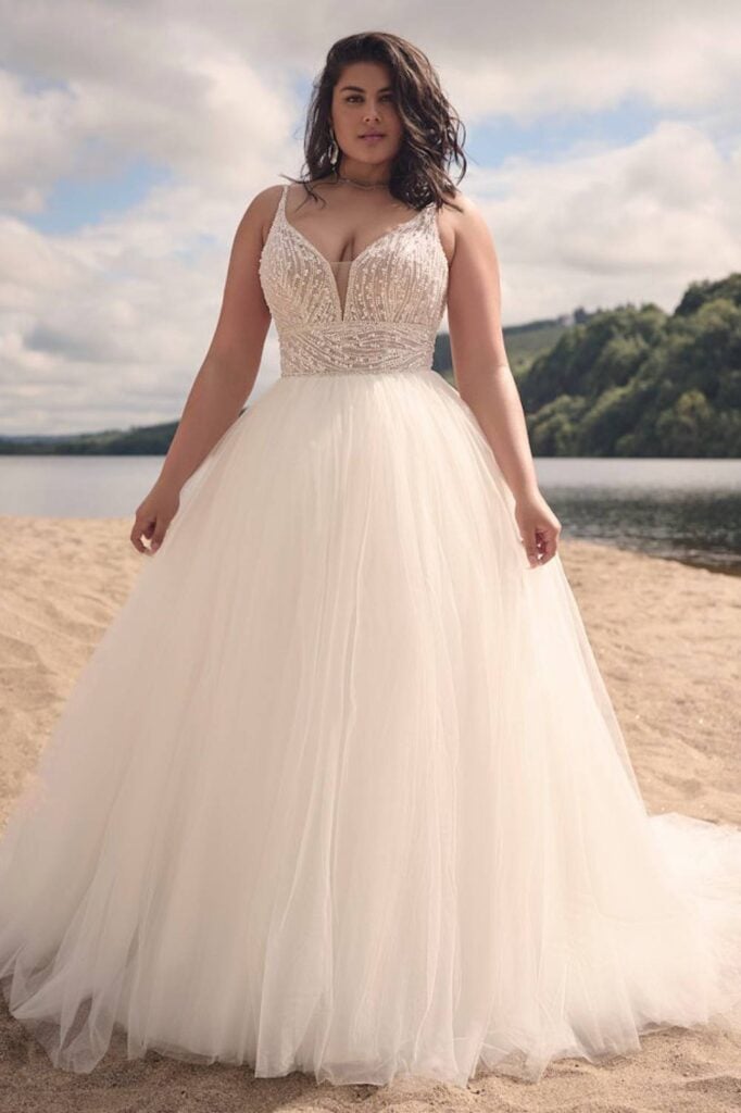 Tulle fairytale wedding dress with beaded bodice and soft skirt.