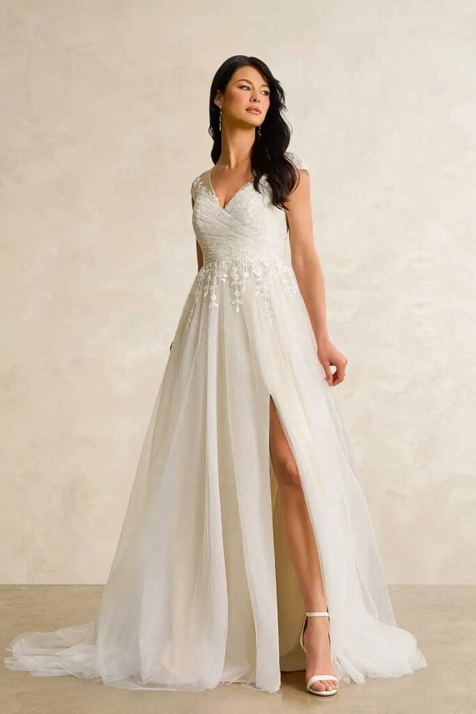 V-neck fairytale wedding dress with embroidered bodice.