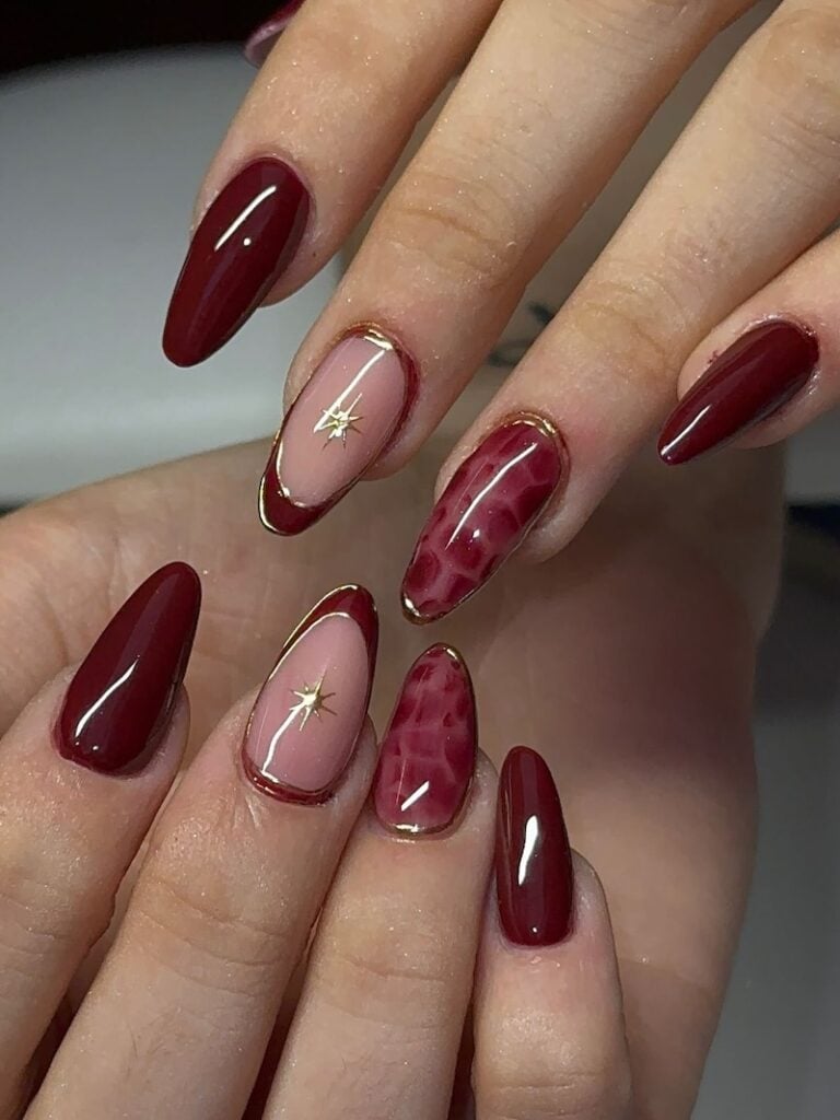 Nude nails with a thin metallic contour tracing the French tip edge