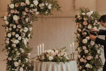 wedding ceremony flowers transferred to wedding reception space