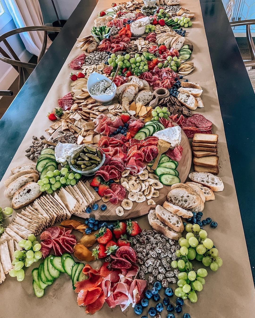 Whimsy wedding charcuterie table via Instagram @marinamcavoy