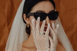 bride wearing gloves