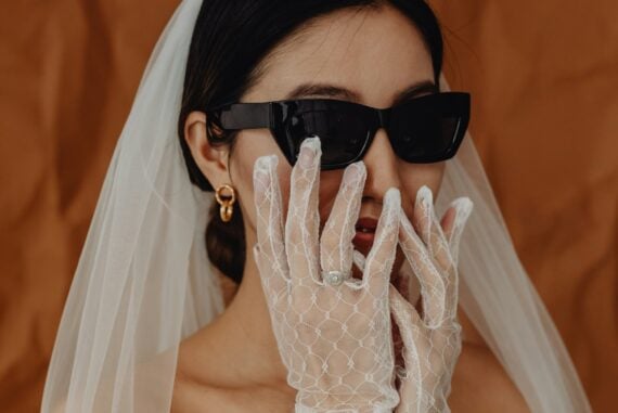 bride wearing gloves