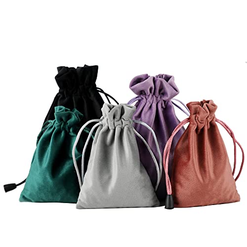 Velvet drawstring jewelry pouches in soft colors for heirloom presentation