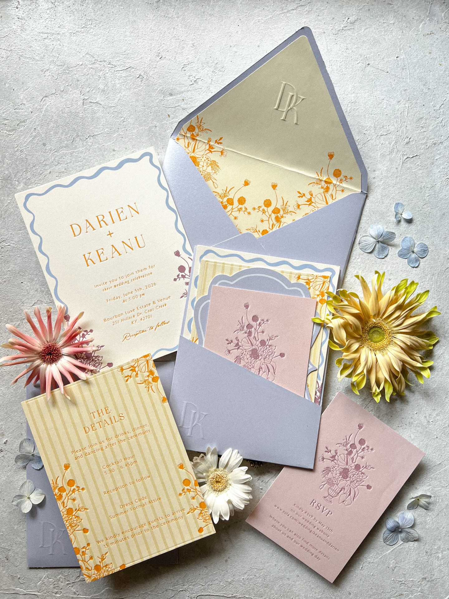 Custom wedding invitation suite with lavender envelope, butter yellow details, and pink and gold accents