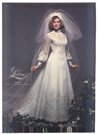 1970s Galina wedding gown with a beaded scalloped hem and short bubble veil