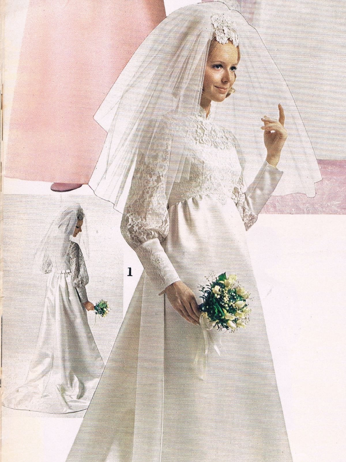 1970s bride in a high-neck lace gown under a full cathedral pouf veil