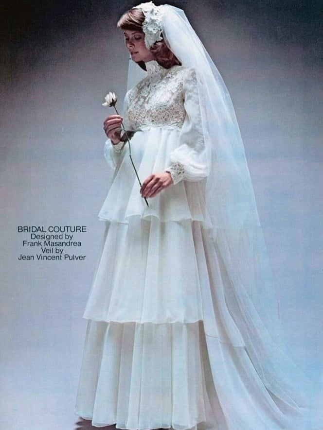 Frank Masandrea 1970s bridal couture gown with a lace bib and three tiers of chiffon