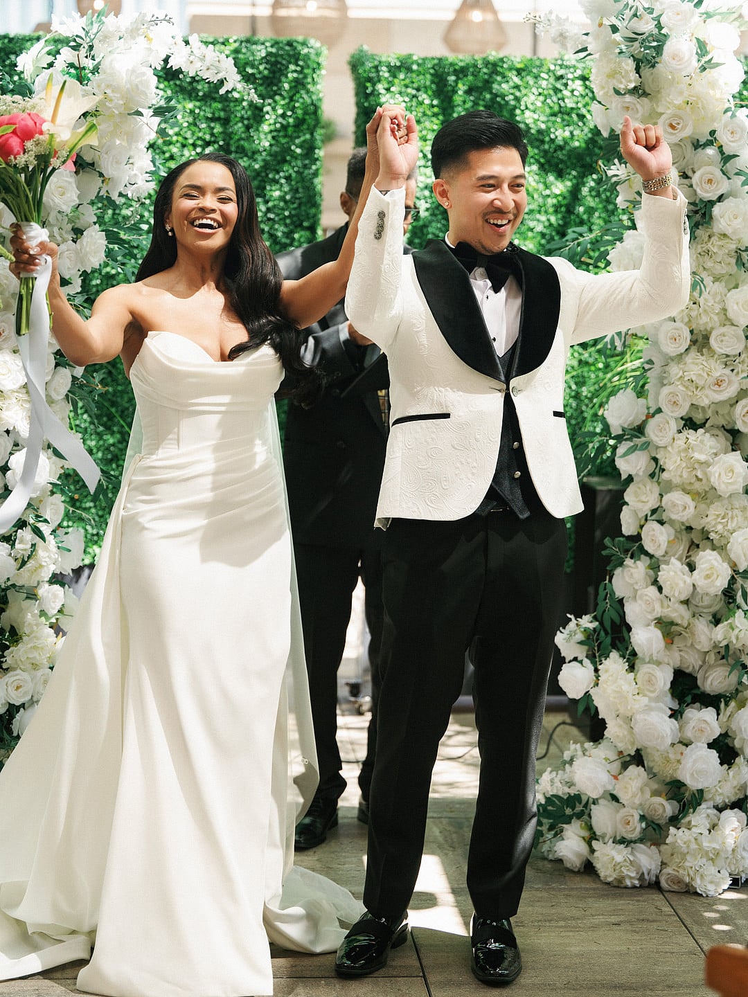 Dyeneka holding her bright bouquet