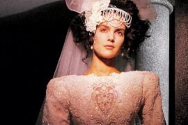 1988 Ilissa Golden Awards ad, bride with pearl-draped headpiece over big dark curls
