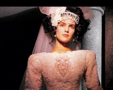 1988 Ilissa Golden Awards ad, bride with pearl-draped headpiece over big dark curls
