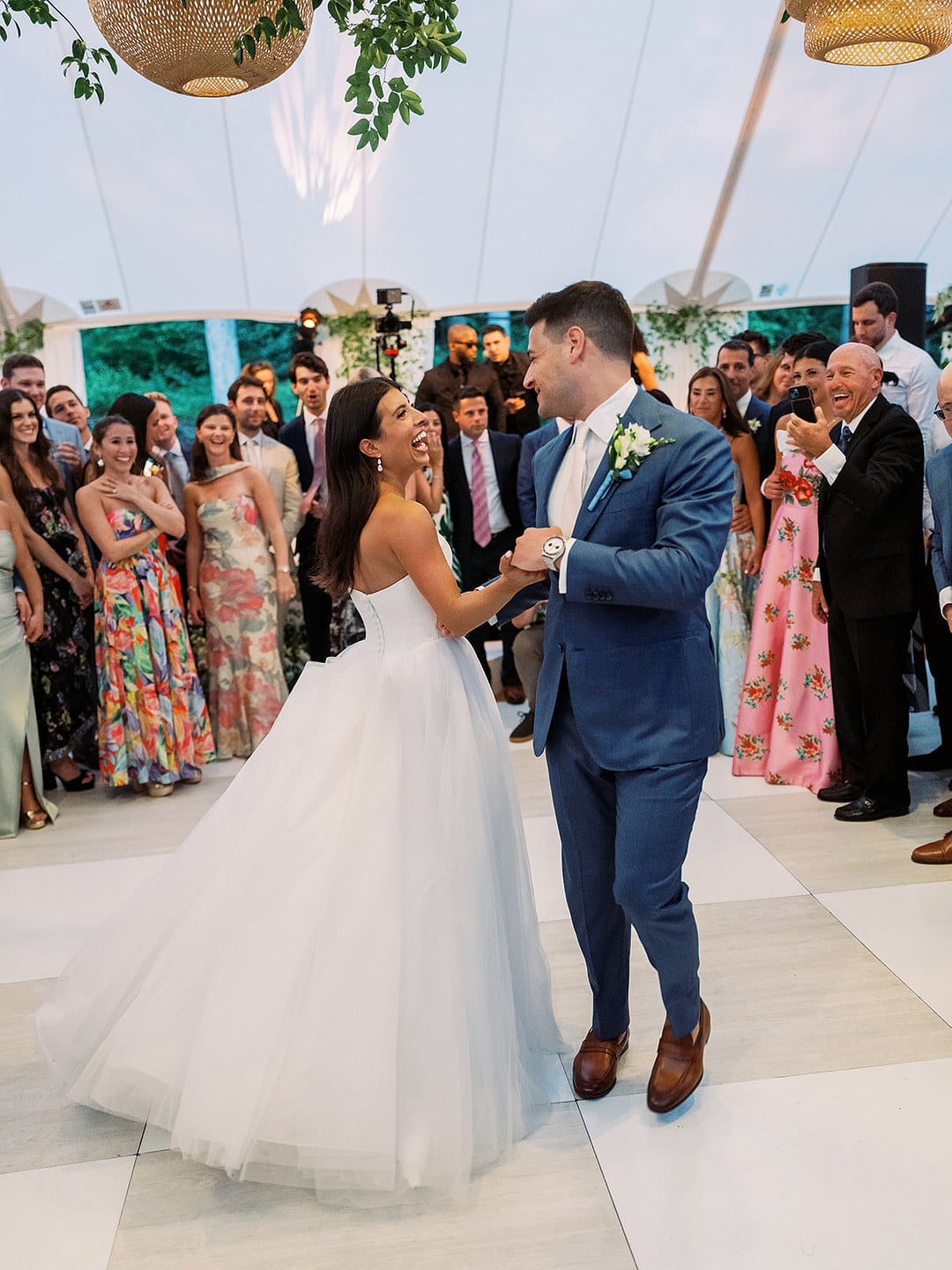 Guests filling the dance floor at the reception