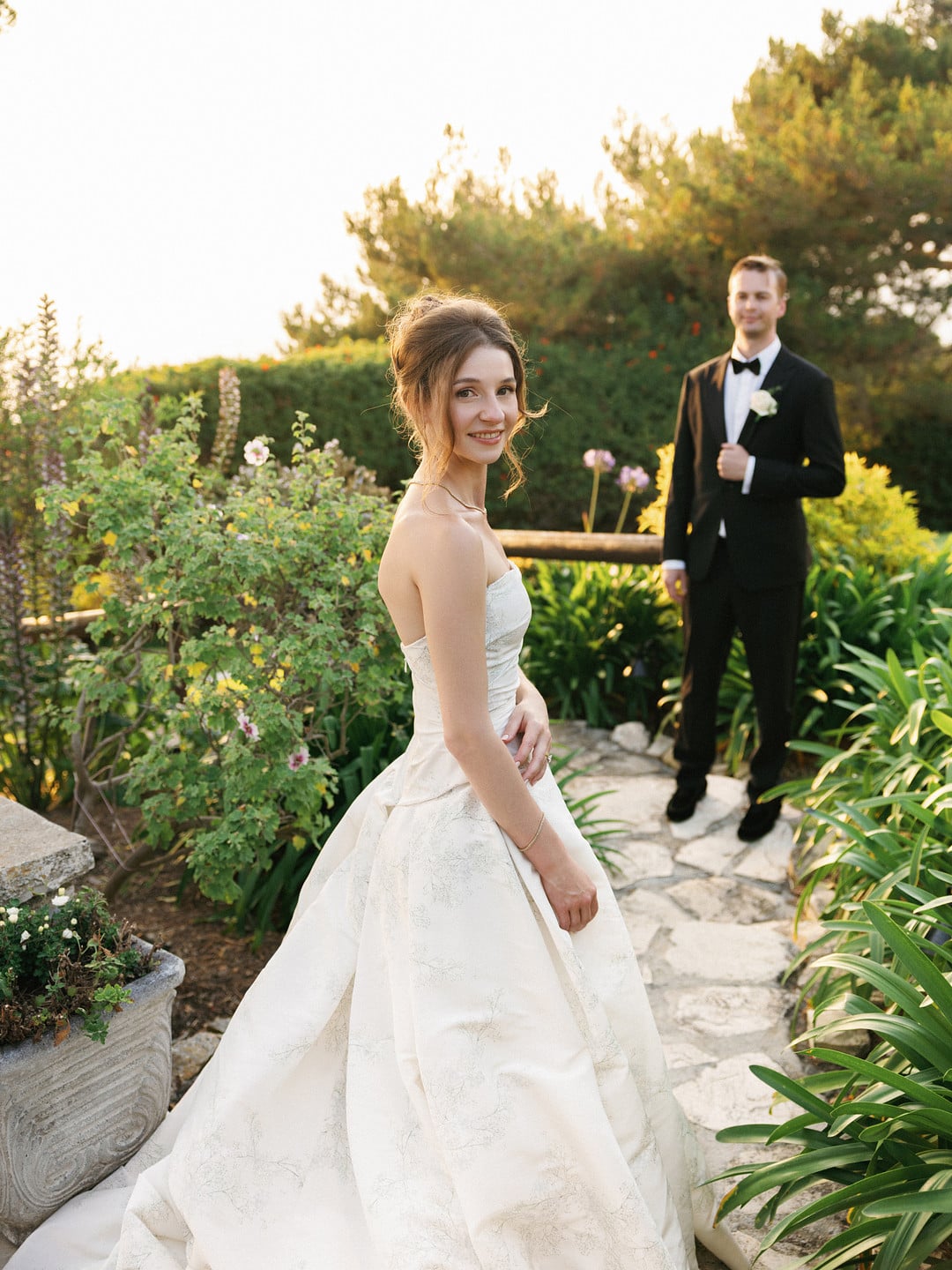 Baylee and Avery on the garden path at golden hour at La Venta Inn