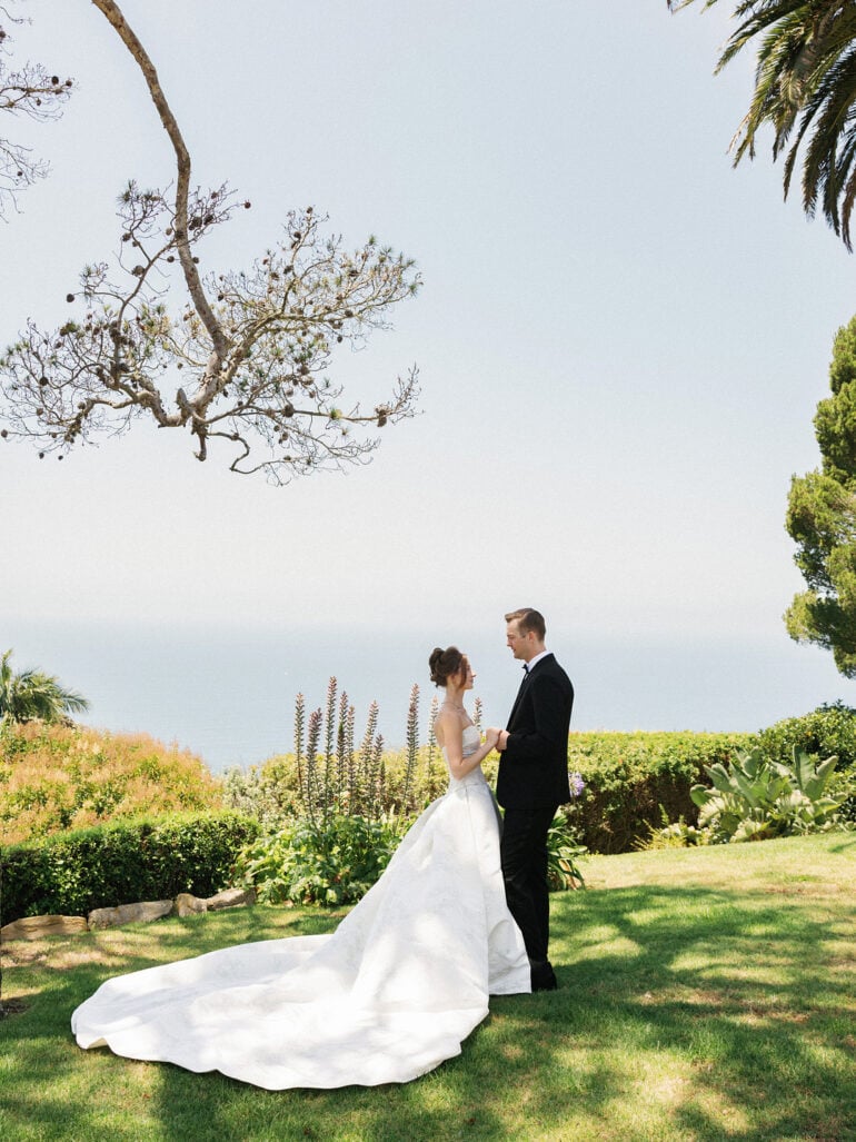Baylee and Avery on the bluff at La Venta Inn with the Pacific Ocean behind them