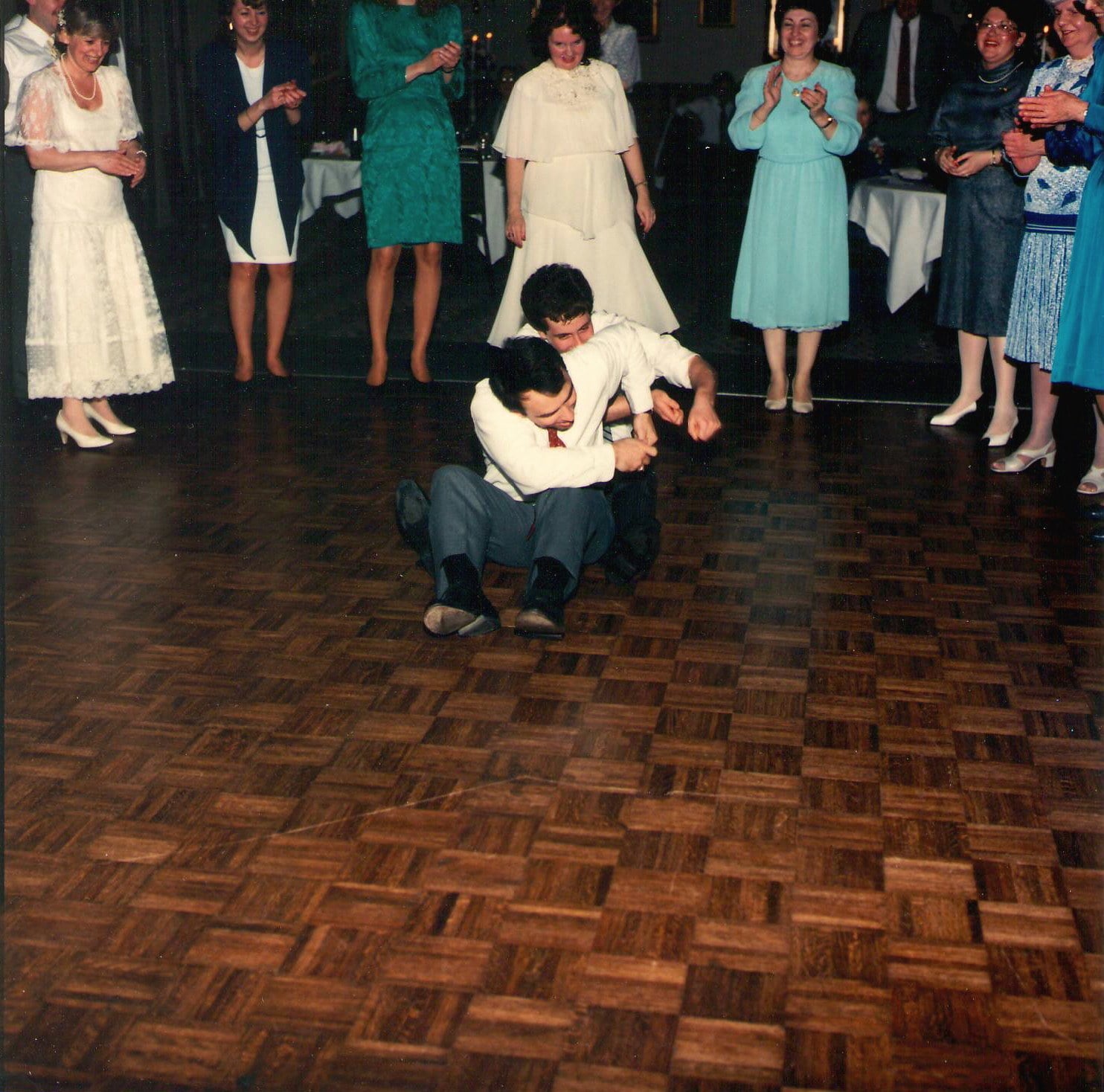 Wedding guest down on the dance floor at a 1988 reception