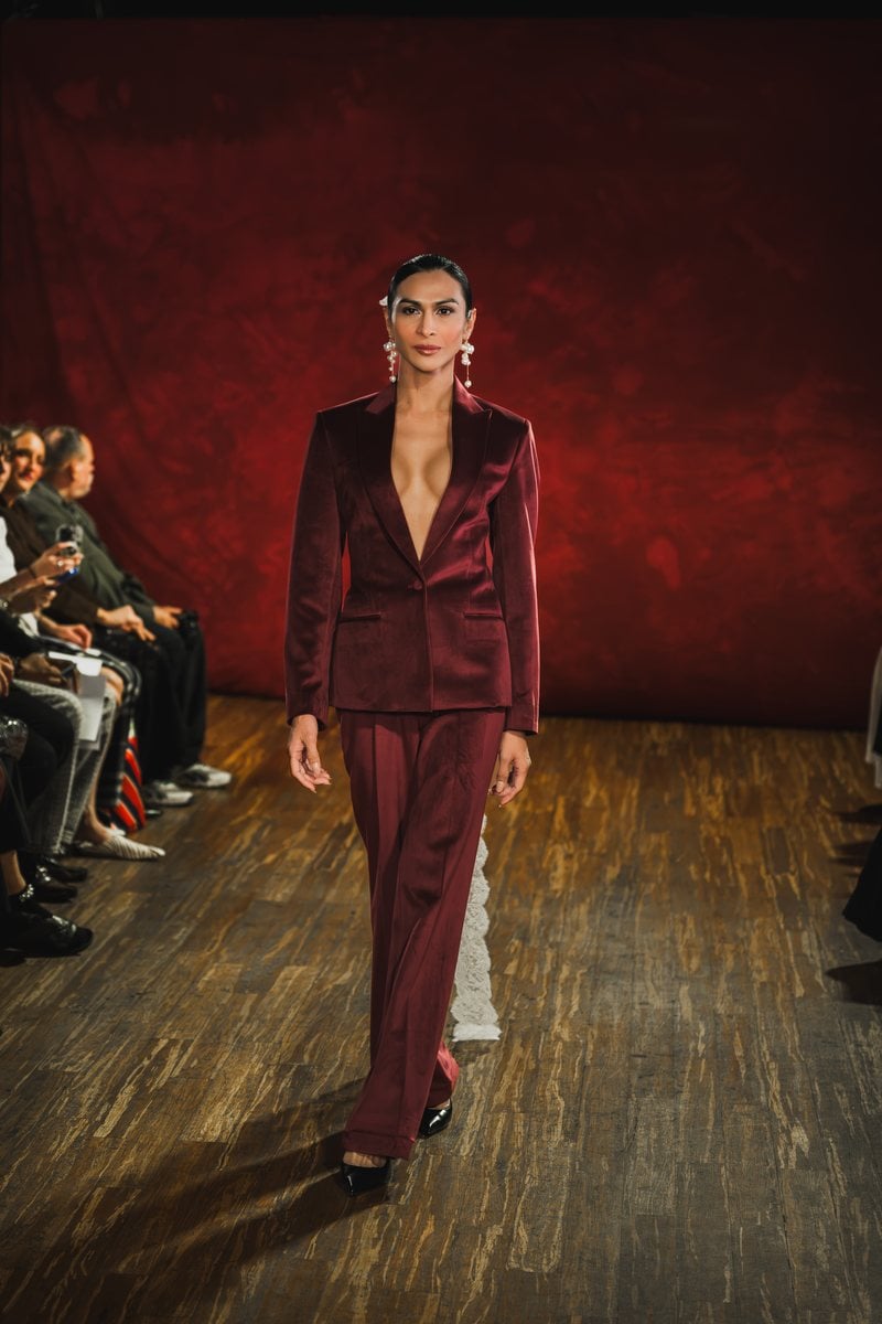 Bi Pham Look 6, a bordeaux velvet suit with a cummerbund that extends into a train