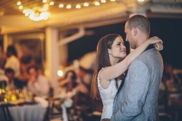 Bride and groom dancing at their beach wedding reception in the Bahamas