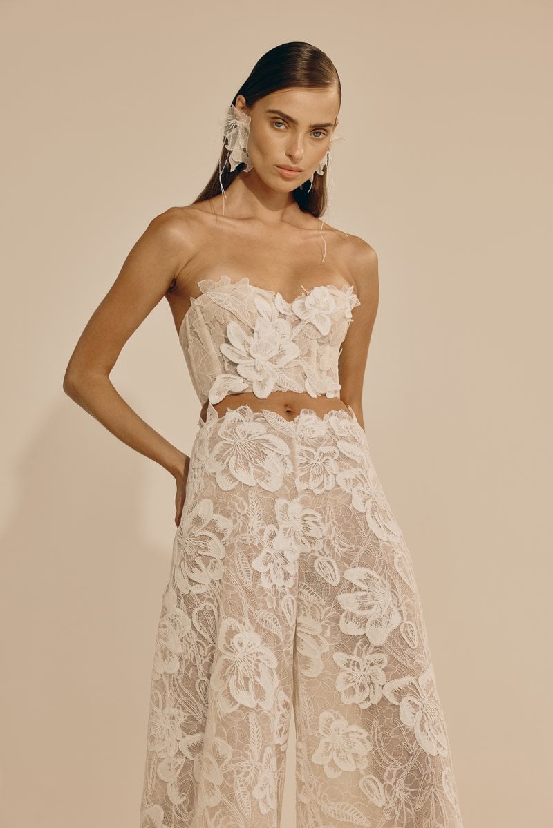 Mira Zwillinger Nura set, a strapless lace corset with wide-leg lace pants