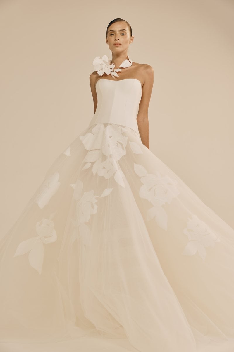 Mira Zwillinger Rio, a Mikado corset gown with handmade flowers floating inside a tulle skirt