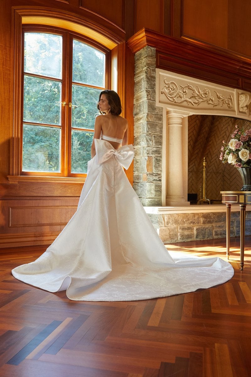 Verdin New York Ellie, a satin gown with an oversized bow at the back